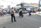 *Giat Rutin  Polsek Kawalu, Laksanakan Pelayanan Gatur Pagi di Simpang 4 Cicariang dan SMPN 12*