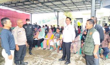 *Pastikan Berjalan Aman, Bhabinkamtibmas Polsek Kawalu Monitoring Penyaluran Bantuan Pangan*